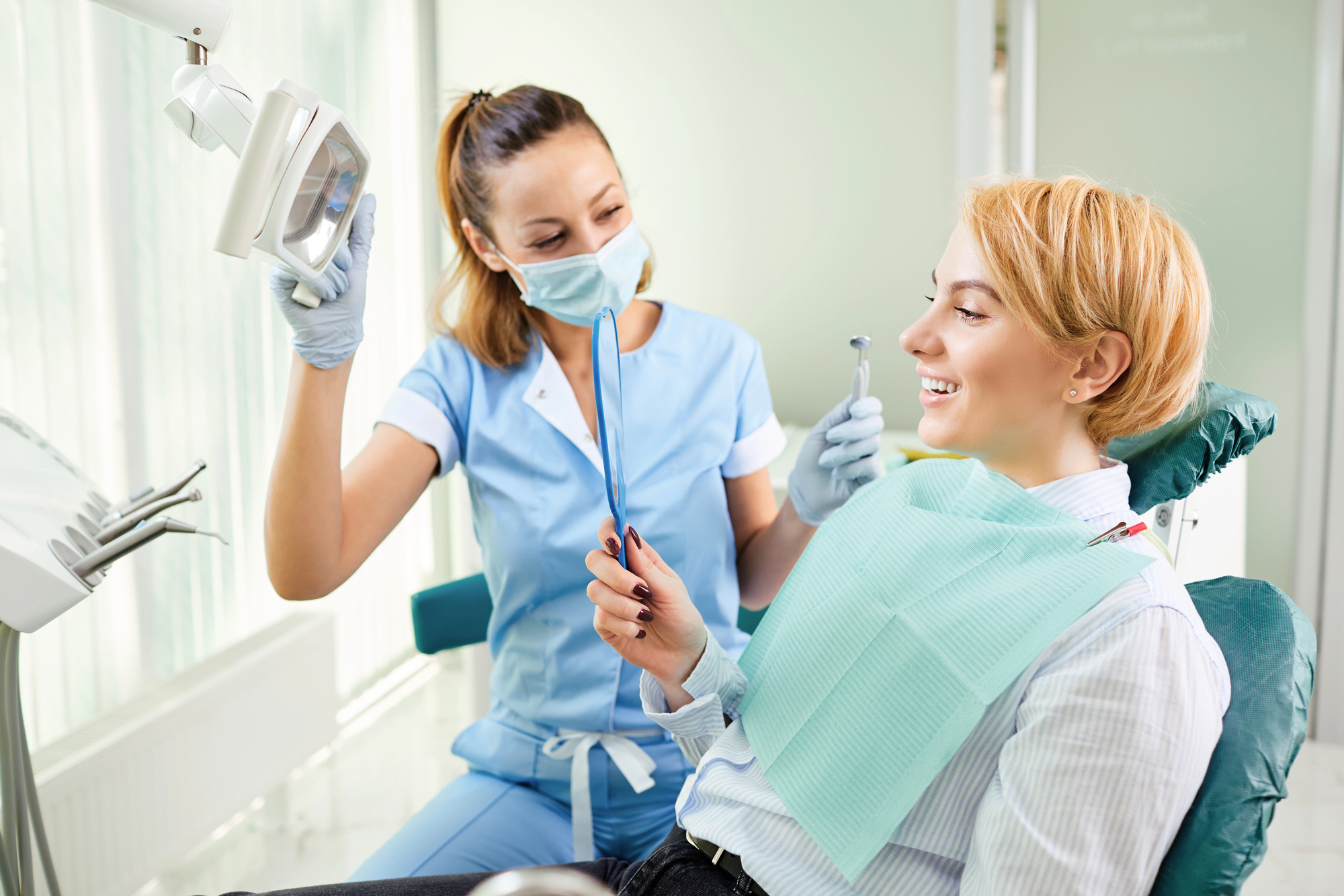 Dentist performing dental exam in Oakbrook Terrace IL